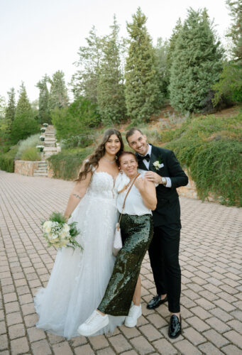 groom and bride with wedding planner