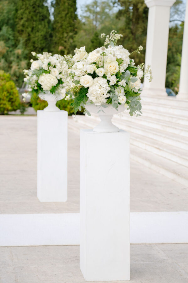 “Outdoor wedding reception with string lights and wooden tables
