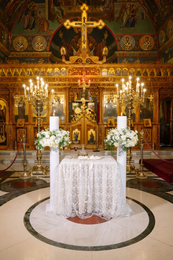 “Outdoor wedding reception with string lights and wooden tables