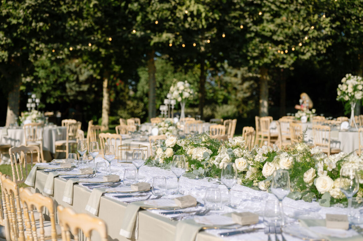 Luxury wedding details with white flowers and chandeliers at Pyrgos Petreza