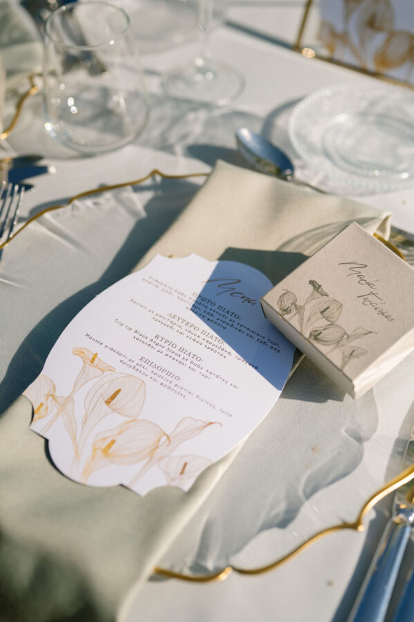 “Outdoor wedding reception with string lights and wooden tables